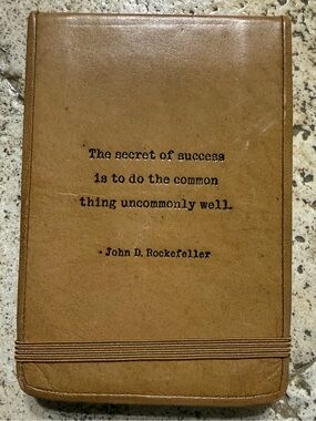 Two’s Company Leather Flip Notebook with Embossed Saying by Rockefeller